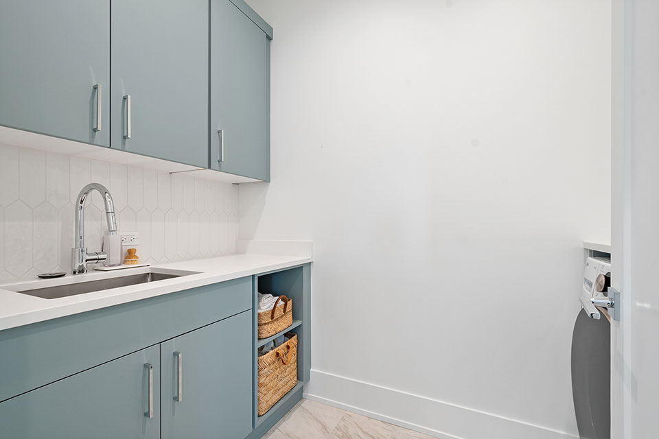 Glenview-Custom-Home-106 - Laundry Cabinets - Globex Developments Custom Homes