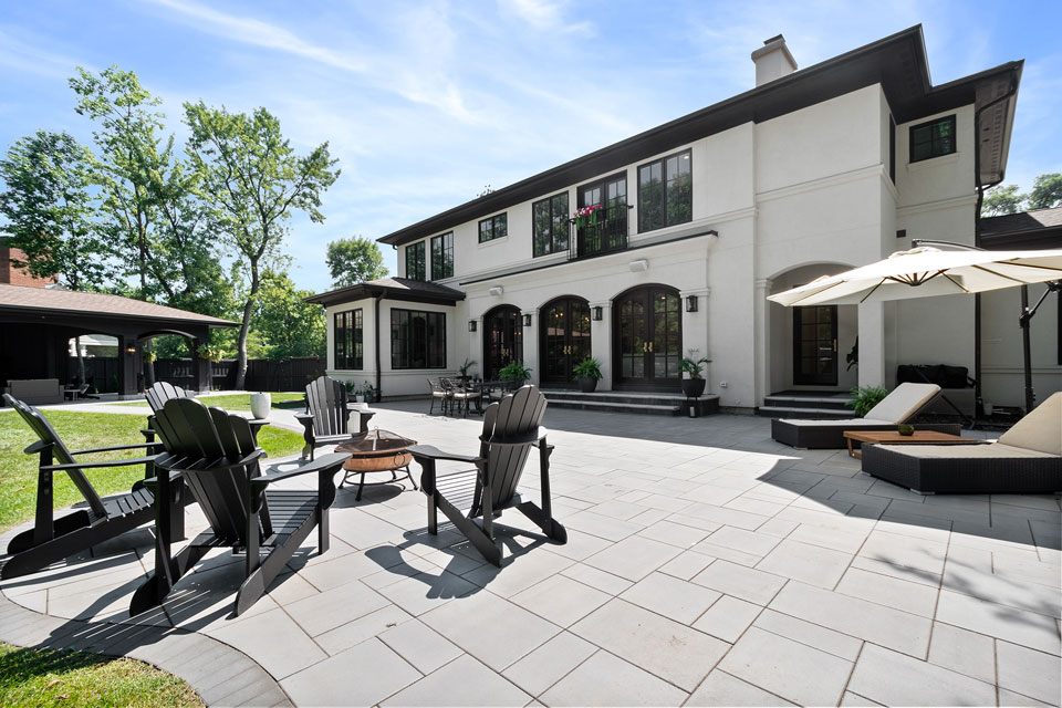 Glenview-Custom-Home-107 - Paved Backyard Patio Firepit - Globex Developments Custom Homes