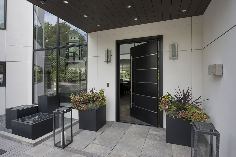 Modern-Home-Highland-Park - Pivot-Front-Door-Open - Globex Developments Custom Homes